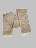 Textured scarf with fringes on a solid background