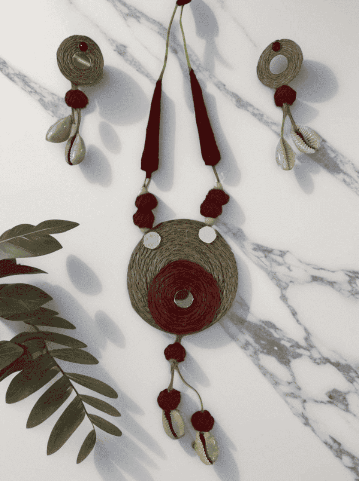 Maroon round with tassel necklace set