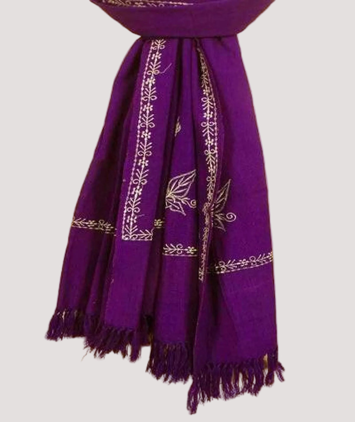 Purple scarf with intricate white patterns